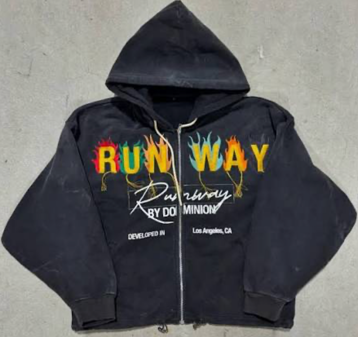 DOMINION RUNWAY TASSEL ZIP UP